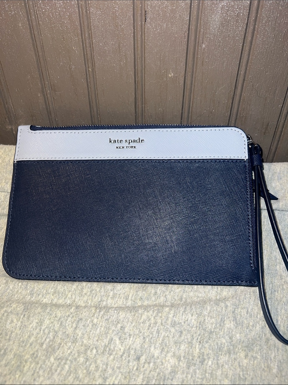 kate spade navy and baby blue wristlet pouch